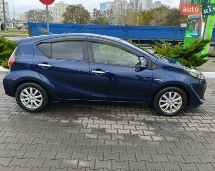 Синий Тойота Aqua, объемом двигателя 1.5 л и пробегом 77 тыс. км за 12500 $, фото 2 на Automoto.ua