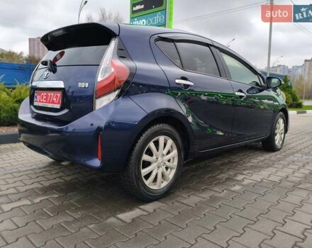 Синий Тойота Aqua, объемом двигателя 1.5 л и пробегом 77 тыс. км за 12500 $, фото 4 на Automoto.ua