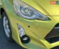 Зелений Тойота Aqua, об'ємом двигуна 1.5 л та пробігом 112 тис. км за 10940 $, фото 2 на Automoto.ua