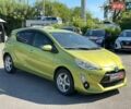 Зелений Тойота Aqua, об'ємом двигуна 1.5 л та пробігом 112 тис. км за 10940 $, фото 3 на Automoto.ua