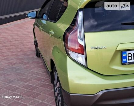 Зелений Тойота Aqua, об'ємом двигуна 1.5 л та пробігом 63 тис. км за 12699 $, фото 15 на Automoto.ua