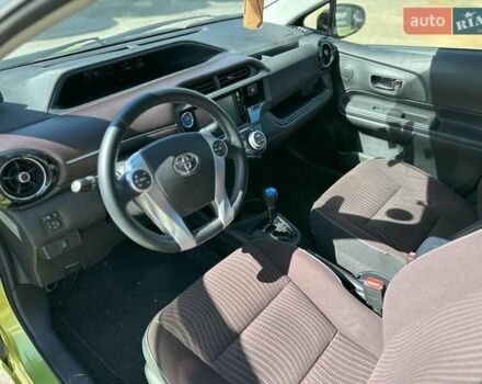 Зелений Тойота Aqua, об'ємом двигуна 1.5 л та пробігом 112 тис. км за 10940 $, фото 15 на Automoto.ua