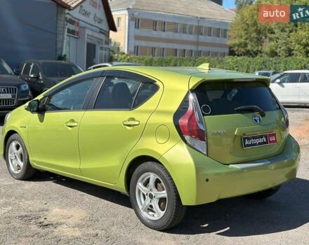 Зелений Тойота Aqua, об'ємом двигуна 1.5 л та пробігом 112 тис. км за 10940 $, фото 5 на Automoto.ua