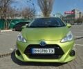 Зеленый Тойота Aqua, объемом двигателя 1.5 л и пробегом 131 тыс. км за 9500 $, фото 1 на Automoto.ua