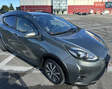 Зеленый Тойота Aqua, объемом двигателя 1.5 л и пробегом 93 тыс. км за 15500 $, фото 5 на Automoto.ua