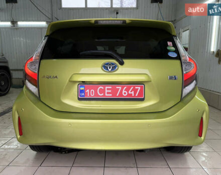 Зелений Тойота Aqua, об'ємом двигуна 1.5 л та пробігом 108 тис. км за 12900 $, фото 4 на Automoto.ua