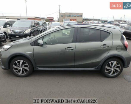 Зелений Тойота Aqua, об'ємом двигуна 1.5 л та пробігом 96 тис. км за 13500 $, фото 6 на Automoto.ua