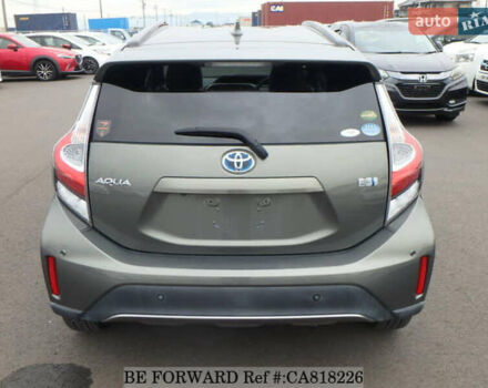 Зелений Тойота Aqua, об'ємом двигуна 1.5 л та пробігом 96 тис. км за 13500 $, фото 3 на Automoto.ua