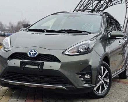 Зелений Тойота Aqua, об'ємом двигуна 1.5 л та пробігом 82 тис. км за 15900 $, фото 5 на Automoto.ua