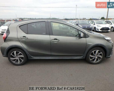 Зелений Тойота Aqua, об'ємом двигуна 1.5 л та пробігом 96 тис. км за 13500 $, фото 2 на Automoto.ua