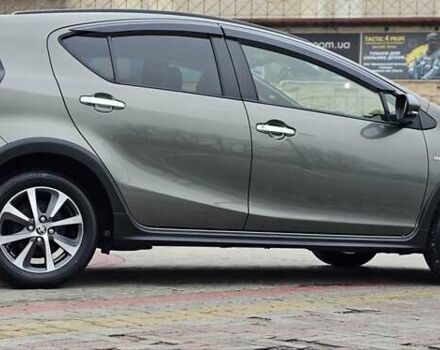 Зелений Тойота Aqua, об'ємом двигуна 1.5 л та пробігом 82 тис. км за 15900 $, фото 26 на Automoto.ua