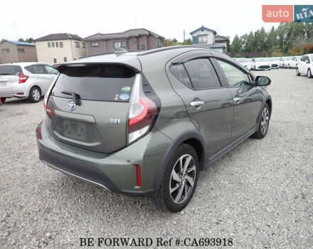 Зеленый Тойота Aqua, объемом двигателя 1.5 л и пробегом 58 тыс. км за 14600 $, фото 4 на Automoto.ua