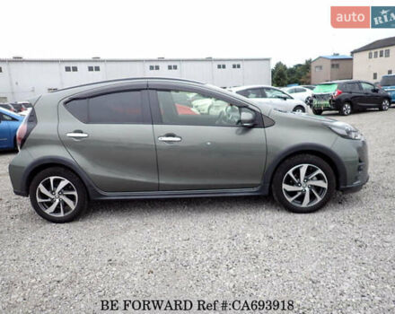 Зеленый Тойота Aqua, объемом двигателя 1.5 л и пробегом 58 тыс. км за 14600 $, фото 6 на Automoto.ua