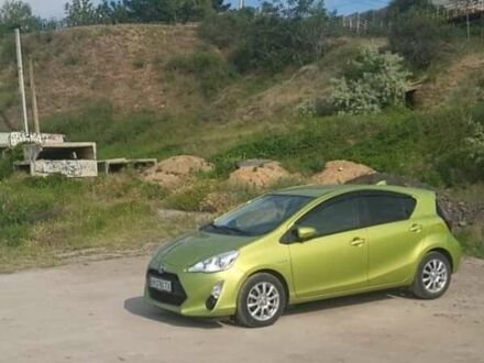 Зелений Тойота Aqua, об'ємом двигуна 1.5 л та пробігом 126 тис. км за 12000 $, фото 1 на Automoto.ua