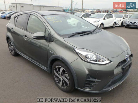 Зеленый Тойота Aqua, объемом двигателя 1.5 л и пробегом 96 тыс. км за 13500 $, фото 1 на Automoto.ua