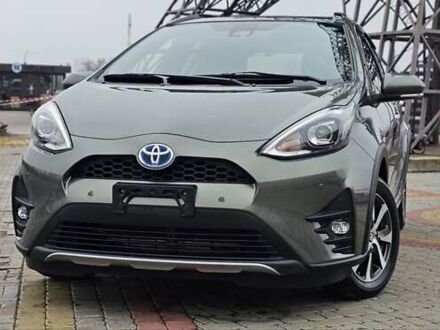 Зелений Тойота Aqua, об'ємом двигуна 1.5 л та пробігом 82 тис. км за 15900 $, фото 1 на Automoto.ua