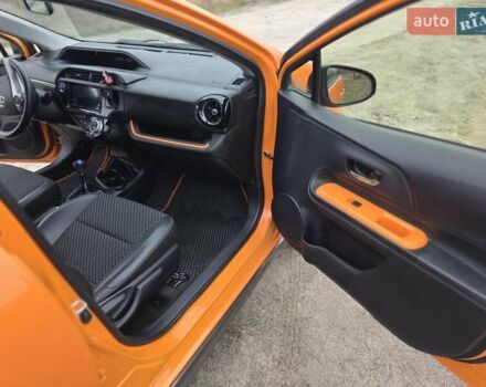 Оранжевый Тойота Aqua, объемом двигателя 1.5 л и пробегом 81 тыс. км за 11500 $, фото 18 на Automoto.ua