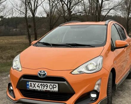 Оранжевый Тойота Aqua, объемом двигателя 1.5 л и пробегом 81 тыс. км за 11500 $, фото 2 на Automoto.ua