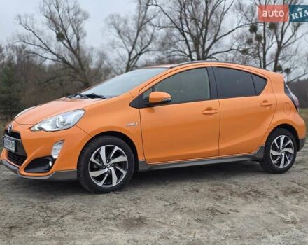 Оранжевый Тойота Aqua, объемом двигателя 1.5 л и пробегом 81 тыс. км за 11500 $, фото 1 на Automoto.ua