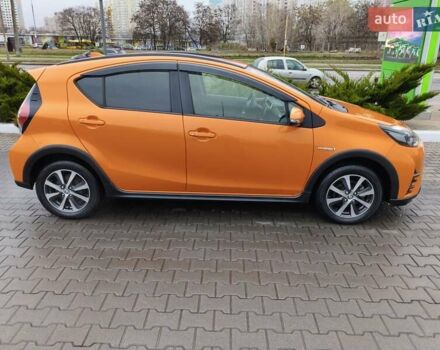 Оранжевый Тойота Aqua, объемом двигателя 1.5 л и пробегом 97 тыс. км за 13400 $, фото 2 на Automoto.ua