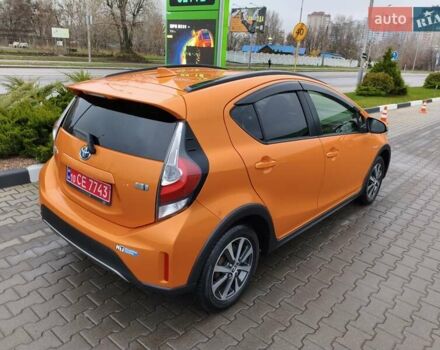 Оранжевый Тойота Aqua, объемом двигателя 1.5 л и пробегом 97 тыс. км за 13400 $, фото 3 на Automoto.ua