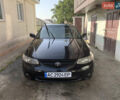 Черный Тойота Camry Solara, объемом двигателя 3 л и пробегом 200 тыс. км за 4500 $, фото 1 на Automoto.ua