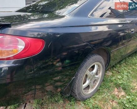 Черный Тойота Camry Solara, объемом двигателя 2.4 л и пробегом 239 тыс. км за 4953 $, фото 3 на Automoto.ua