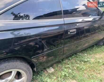 Черный Тойота Camry Solara, объемом двигателя 2.4 л и пробегом 239 тыс. км за 4953 $, фото 2 на Automoto.ua