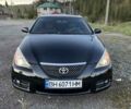 Черный Тойота Camry Solara, объемом двигателя 2.4 л и пробегом 200 тыс. км за 5600 $, фото 1 на Automoto.ua