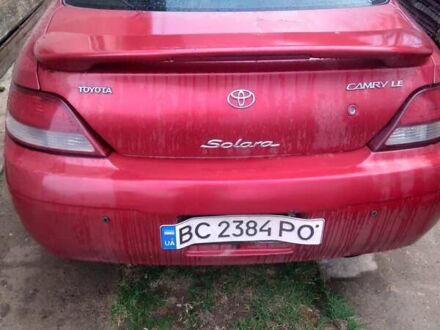 Красный Тойота Camry Solara, объемом двигателя 2.2 л и пробегом 317 тыс. км за 4000 $, фото 1 на Automoto.ua