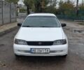 Белый Тойота Carina E, объемом двигателя 1.6 л и пробегом 390 тыс. км за 2300 $, фото 1 на Automoto.ua