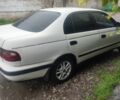 Белый Тойота Carina E, объемом двигателя 2 л и пробегом 515 тыс. км за 1538 $, фото 1 на Automoto.ua