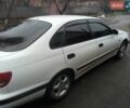 Белый Тойота Carina E, объемом двигателя 1.6 л и пробегом 320 тыс. км за 3200 $, фото 1 на Automoto.ua