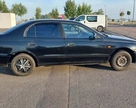 Черный Тойота Carina E, объемом двигателя 1.8 л и пробегом 443 тыс. км за 4000 $, фото 4 на Automoto.ua