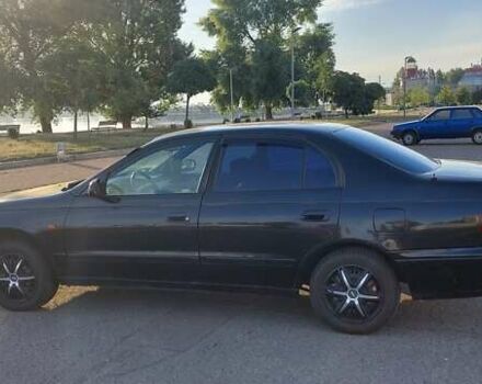 Черный Тойота Carina E, объемом двигателя 1.8 л и пробегом 443 тыс. км за 4000 $, фото 5 на Automoto.ua