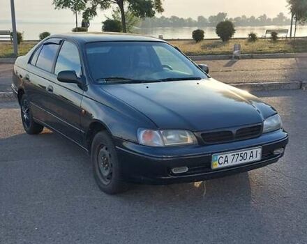 Черный Тойота Carina E, объемом двигателя 1.8 л и пробегом 443 тыс. км за 4000 $, фото 2 на Automoto.ua