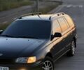Черный Тойота Carina E, объемом двигателя 1.8 л и пробегом 290 тыс. км за 3300 $, фото 1 на Automoto.ua