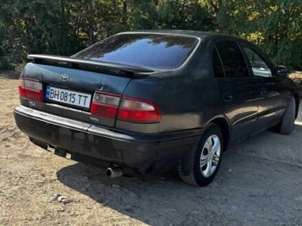 Черный Тойота Carina E, объемом двигателя 1.6 л и пробегом 450 тыс. км за 850 $, фото 1 на Automoto.ua