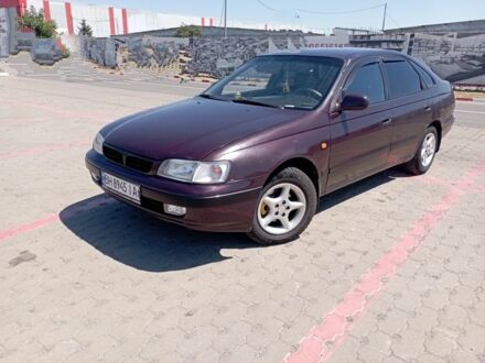 Фиолетовый Тойота Carina E, объемом двигателя 1.6 л и пробегом 520 тыс. км за 2800 $, фото 1 на Automoto.ua