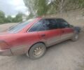 Красный Тойота Carina E, объемом двигателя 2 л и пробегом 46 тыс. км за 841 $, фото 1 на Automoto.ua