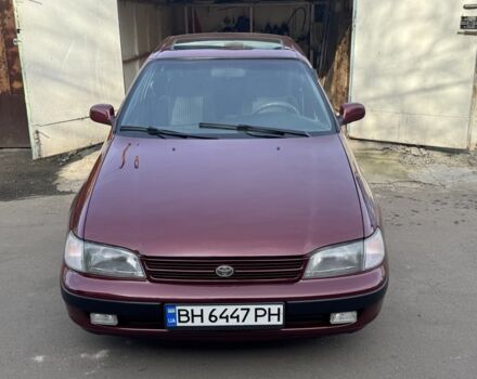 Красный Тойота Carina E, объемом двигателя 1.6 л и пробегом 259 тыс. км за 2800 $, фото 1 на Automoto.ua