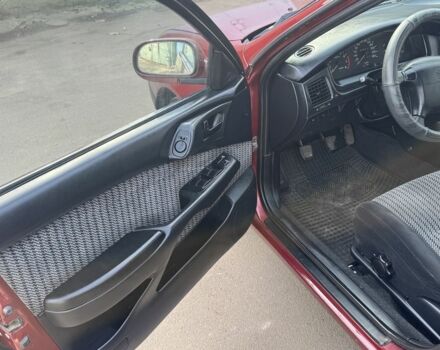 Красный Тойота Carina E, объемом двигателя 1.6 л и пробегом 259 тыс. км за 2800 $, фото 7 на Automoto.ua