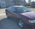 Тойота Carina E 1993 в Павлограде на Automoto.ua Красный Тойота Carina E, объемом двигателя 2 л и пробегом 380 тыс. км за 2500 $, фото 4 на Automoto.ua