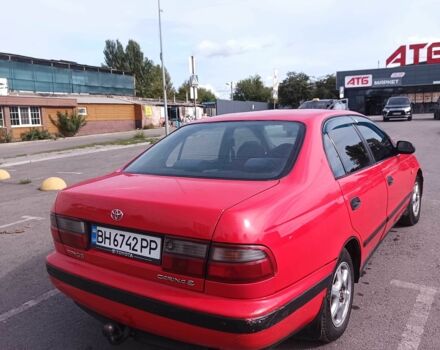 Червоний Тойота Carina E, об'ємом двигуна 2 л та пробігом 290 тис. км за 2300 $, фото 3 на Automoto.ua