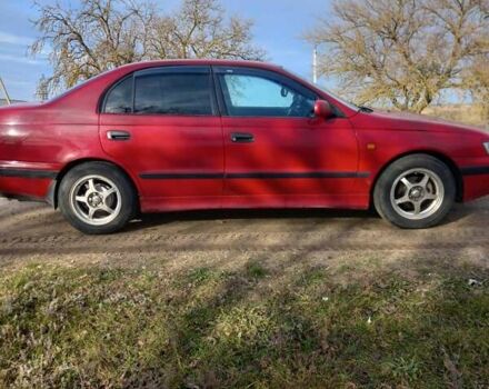 Красный Тойота Carina E, объемом двигателя 2 л и пробегом 375 тыс. км за 3100 $, фото 2 на Automoto.ua