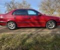 Красный Тойота Carina E, объемом двигателя 2 л и пробегом 375 тыс. км за 3100 $, фото 2 на Automoto.ua