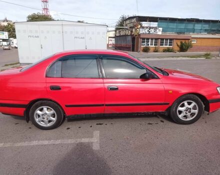 Червоний Тойота Carina E, об'ємом двигуна 2 л та пробігом 290 тис. км за 2300 $, фото 4 на Automoto.ua