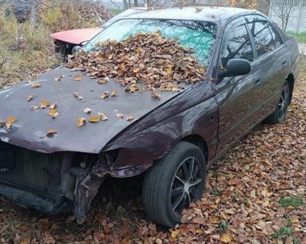 Червоний Тойота Carina E, об'ємом двигуна 1.6 л та пробігом 350 тис. км за 952 $, фото 9 на Automoto.ua