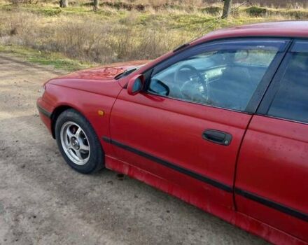 Красный Тойота Carina E, объемом двигателя 2 л и пробегом 375 тыс. км за 3100 $, фото 1 на Automoto.ua