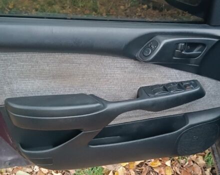 Червоний Тойота Carina E, об'ємом двигуна 1.6 л та пробігом 350 тис. км за 952 $, фото 1 на Automoto.ua